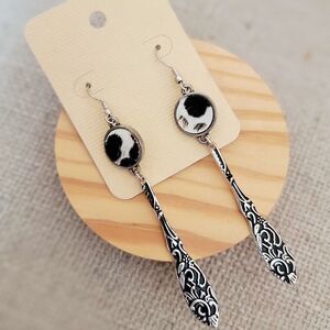 Black and White Cowhide Drop Earrings with Ornate Silver-Tone Detail